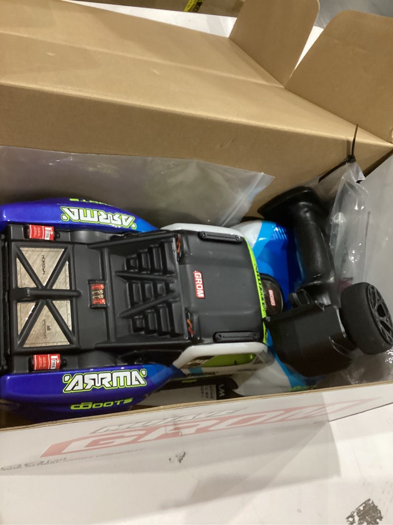 Condition photo showing As Is for ARRMA RC Truck Mojave GROM 4x4 Smart Small Scale Desert Truck, RTR (with Battery and Charger Included) Blue/White ARA2104T2