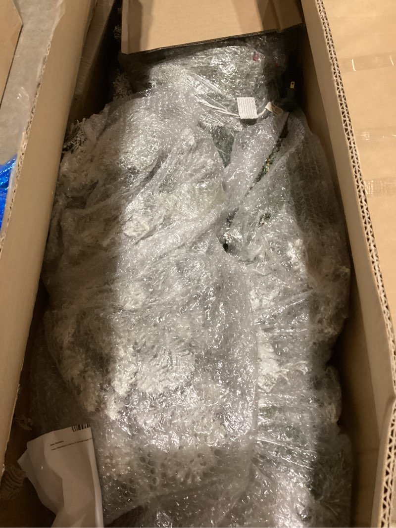 Condition photo showing As Is for Puleo International 6.5 Foot Pre-Lit Slim Flocked Fraser Fir Artificial Christmas Tree with 350 Clear Lights, Green 6.5' Slim Flocked Fraser Fir with 350 Clear Lights Christmas Tree