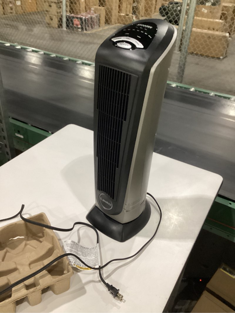 Condition photo showing As Is for Lasko - Portable Ceramic Tower Space Heater with Remote Control - Black/Silver