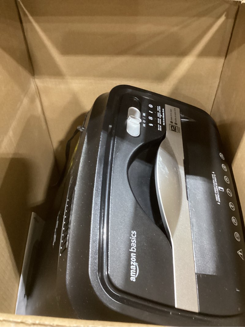 Condition photo showing As Is for Amazon Basics 12 Sheet (new model) Micro Cut Paper and Credit Card CD Shredder With 6 Gallon Bin, Black