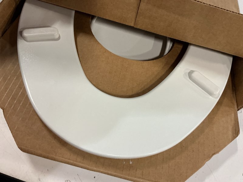 Condition photo showing As Is for mayfair nextstep2 toilet seat with built-in potty training seat, slow-close, removable that will never loosen, elongated, white elongated 1