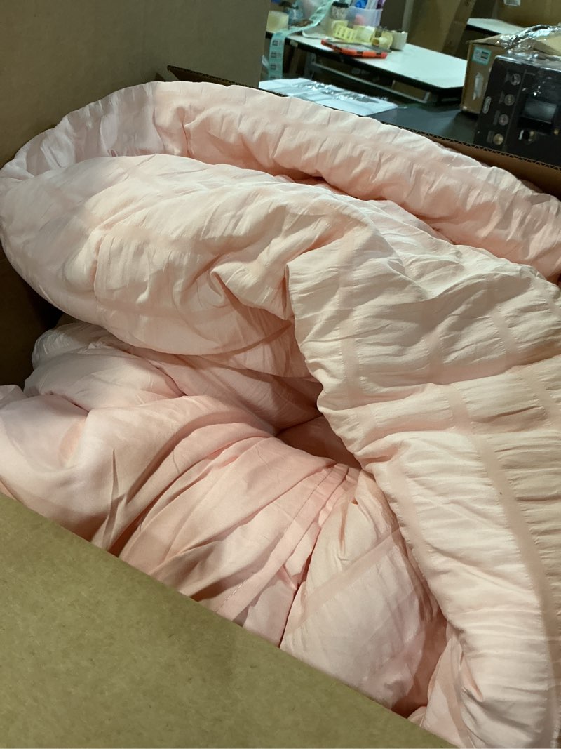 Condition photo showing As Is for CozyLux King Size Comforter Set Blush Pink Seersucker 7 Pieces Bed in a Bag King Comforter Set with Sheets, Luxury Bedding Set with Down Alternative Comforter, Sheets, Pillowcases & Shams All Seasons Blush Pink King