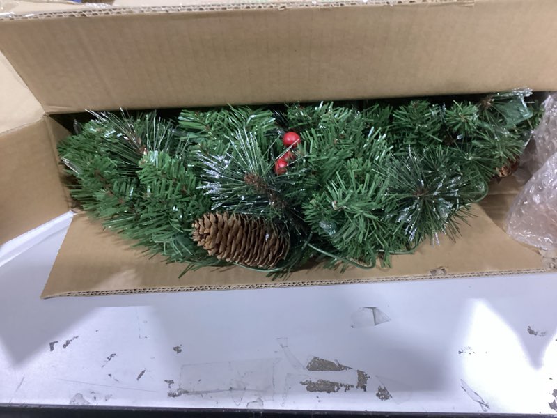 Condition photo showing Good Condition for National Tree Company 24 in Pre-Lit Crestwood Spruce Artificial Christmas Wreath, Christmas Decoration with Glitter, Pinecones, Red Berries, 50 Clear Lights, 160 Tips, Green 24 in Plug In Wreath