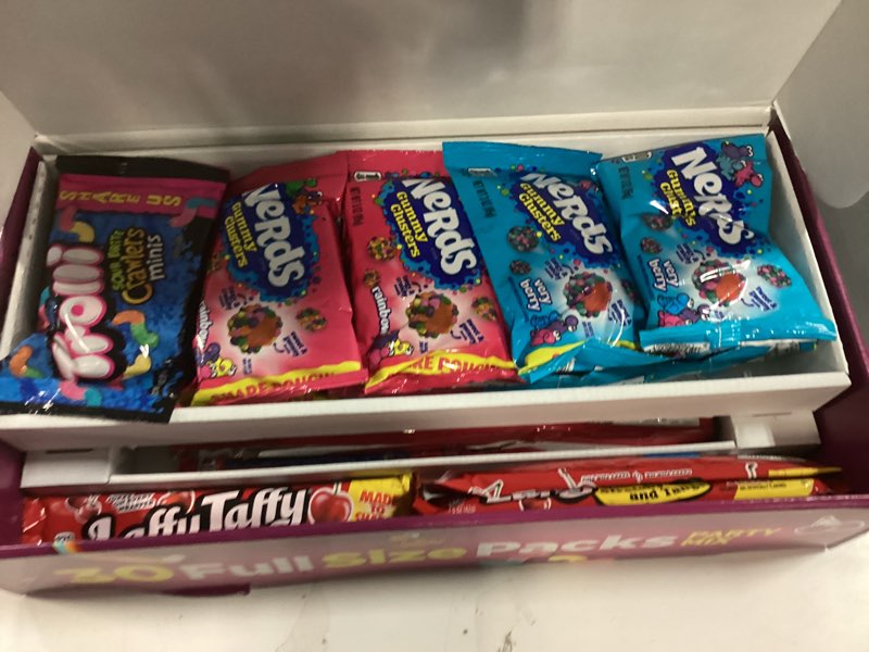 Condition photo showing New/Like New for Nerds, SweeTARTS, Trolli and Laffy Taffy Party Mix Candy (best by april13,26)