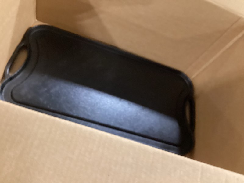 Condition photo showing Good Condition for Amazon Basics Pre-Seasoned Cast Iron Reversible Rectangular Grill/Griddle, Black, 20 x 10.63 x 0.98 inch