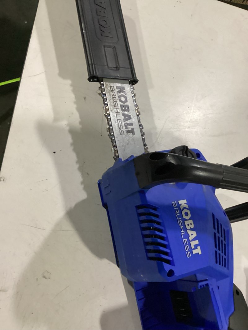 Condition photo showing As Is for 24 volt kobalt chainsaw electric new (battery/charger not included)