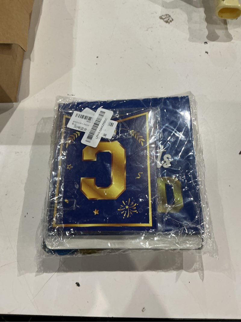 Condition photo showing New/Like New for 2026 graduation decorations kit - blue and gold class of 2026 party decor with congrats grad banner backdrop hanging swirls paper pompoms balloons for high school college graduation party supplies