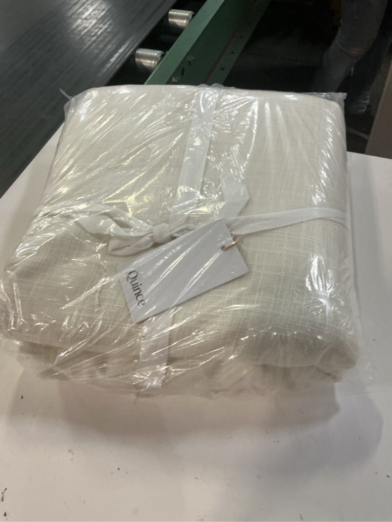 Condition photo showing New/Like New for textured cotton room darkening curtain, 48x84, ivory