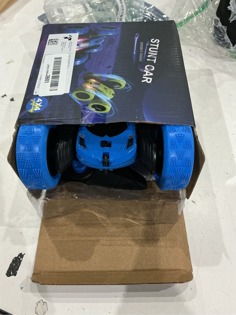 Condition photo showing Good Condition for qunreda remote control car, rc cars toys for kids ages 6-12, 4wd stunt car with led lights & 360° flips, 2.4ghz, upgraded usb-c modular batteries, 8-10 year old boys birthday gift 1-blue