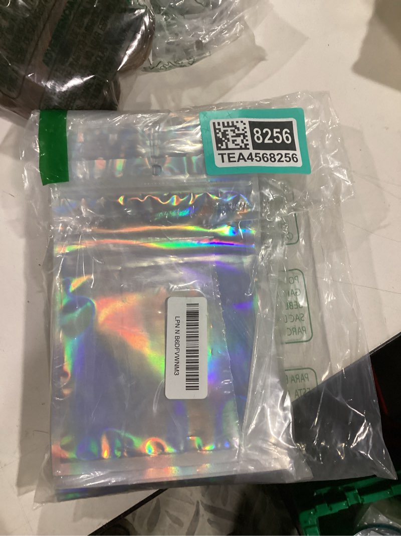 Condition photo showing Good Condition for funfery 100 pcs mylar holographic bags packaging bags,clear resealable smell proof bag foil pouch bag for party favor,food storage baggies packaging for small business(6.3x9.4in,holographic) holographic 6.3 x 9.4 inch