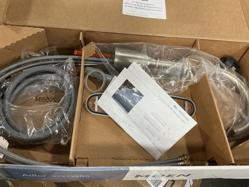 Condition photo showing As Is for moen adler spot resist stainless one-handle high arc pulldown kitchen faucet with power clean, 87233srs spot resist stainless standard