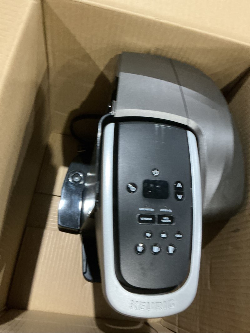Condition photo showing As Is for keurig k-elite single serve k-cup pod coffee maker, with strength and temperature control, iced coffee capability, 8 to 12oz brew size, programmable, brushed slate
