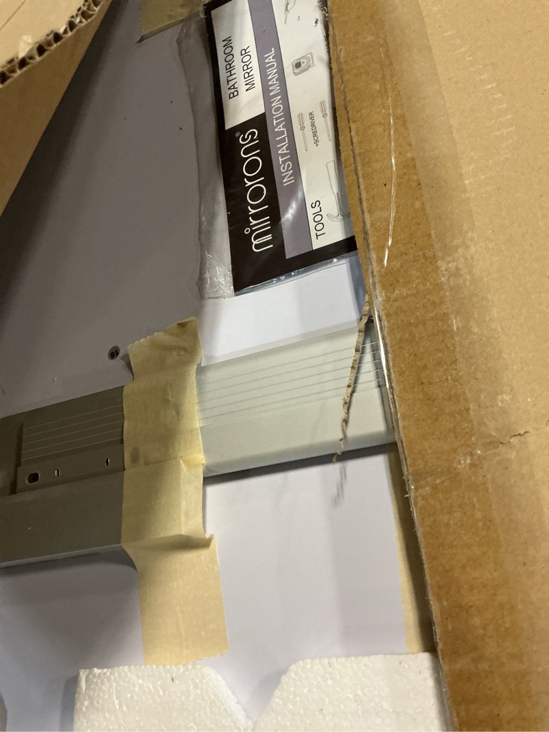 Condition photo showing As Is for mirrorons beveled mirror, bathroom mirrors for wall 24" x 32", frameless rectangle bathroom mirror with beveled edge, hangs horizontally or vertically, upgraded packing upgraded 32"l x 24"w