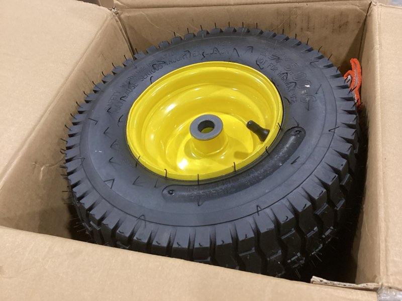 Condition photo showing Good Condition for wiltire brand lawn mower wheels