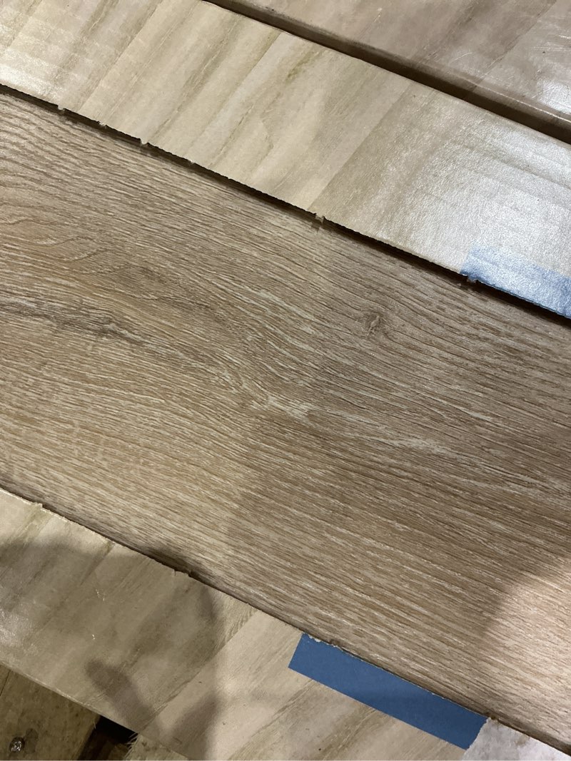 Condition photo showing As Is for lifeproof dusk cherry 22 mil x 8.7 in. w x 48 in. l click lock waterproof luxury vinyl plank flooring (20.1 sqft/case)