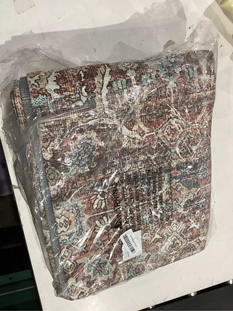 Condition photo showing Good Condition for GENIMO 6x9 Area Rugs for Living Room, Machine Washable Non Slip Vintage Rugs, Low Pile Lightweight Chenille Print Rug for Bedroom, Dining Room, Home Office, Terracotta Indigo Terracotta Indigo 6' x 9' (Rectangular)