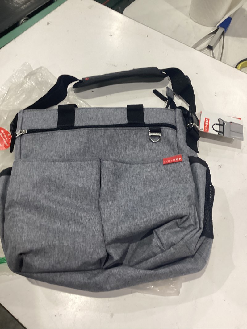 Condition photo showing Good Condition for skip hop duo signature messenger diaper bag heather gray