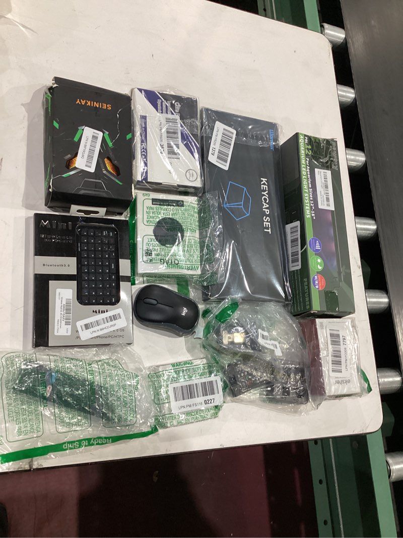 Condition photo showing As Is for assorted lot of electronics (headphones, small gadgets, headsets, etc.) 