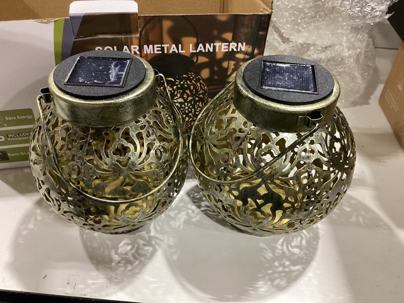 Condition photo showing Good Condition for 2 pack outdoor solar hanging lantern lights metal led decorative lamp for garden patio courtyard lawn and table with hollowed-out design (antique bronze)