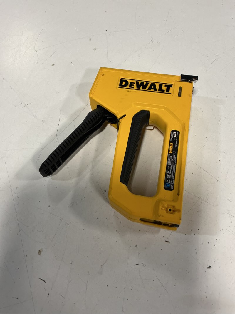 Condition photo showing As Is for heavy-duty compact staple gun