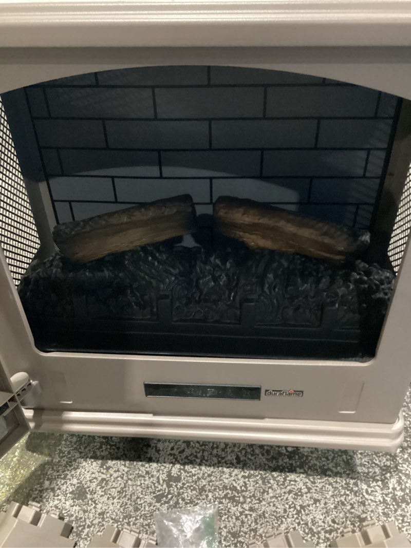 Condition photo showing Good Condition for **not tested**  duraflame electric fireplace stove 1500 watt infrared heater with flickering flame effects - frenchgrey