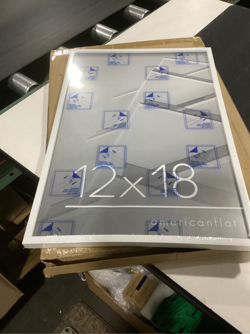 Condition photo showing New/Like New for americanflat 12x18 poster frame with polished plexiglass - streamline collection - thin border picture frame for wall display - hanging hardware included - white white 12x18