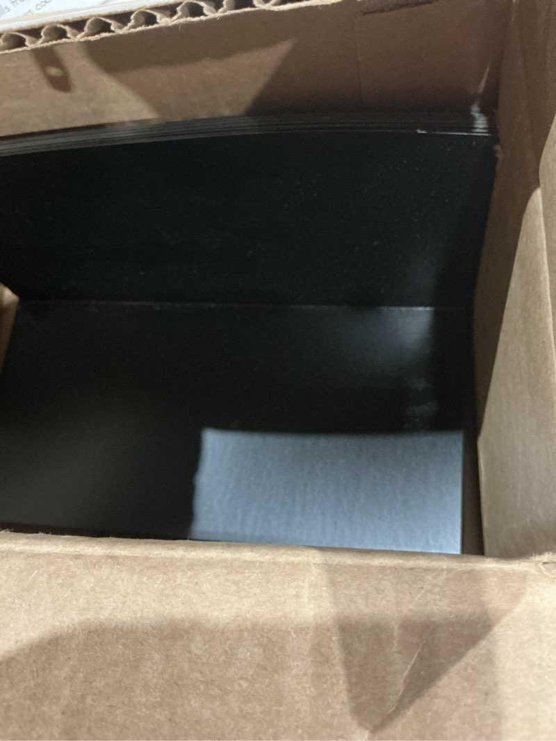 Condition photo showing As Is for 4 in. x 4 in. x 8 in. black aluminum pre-bent step flashing pro pack, 50 pieces