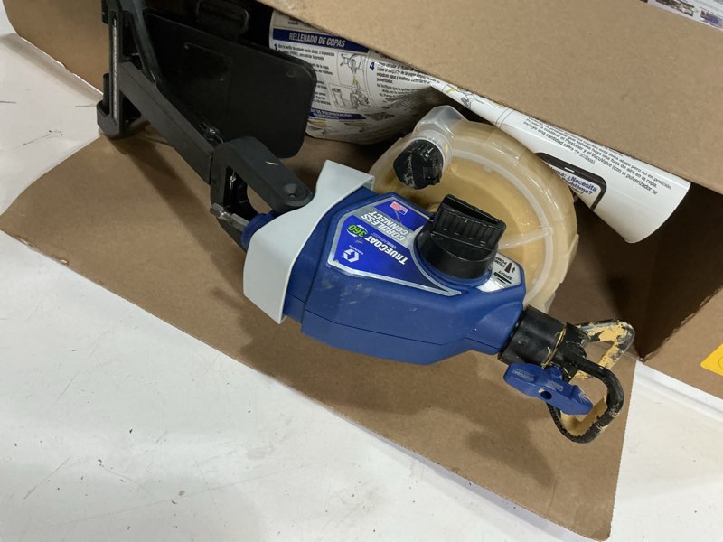 Condition photo showing As Is for graco cordless handheld airless paint sprayer