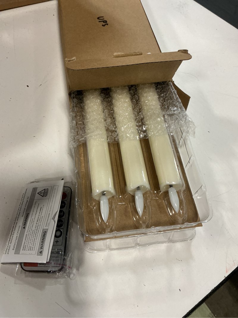 Condition photo showing Good Condition for genswin flameless ivory taper candles flickering with 10-key remote, battery operated led warm 3d wick light window candles real wax pack of 6, christmas home wedding decor(0.78 x 9.64 inch) classic-ivory-9.64"