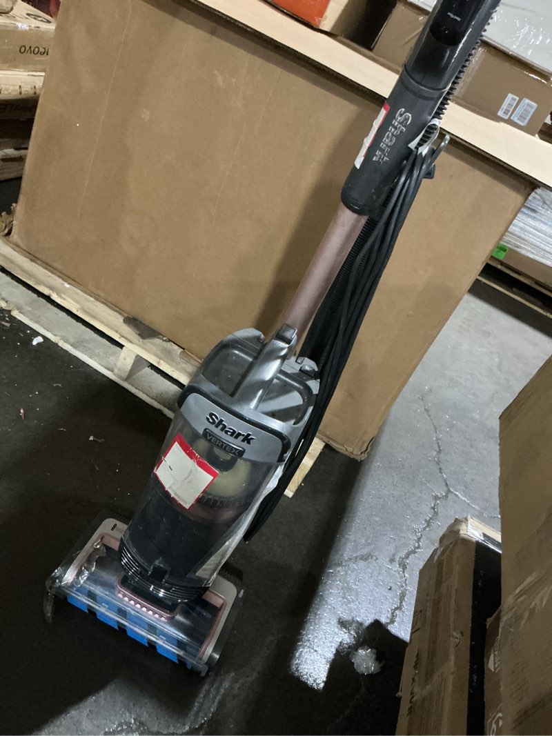 Condition photo showing As Is for powers on shark az2002 vertex powered lift-away upright vacuum with duoclean powerfins, self-cleaning brushroll, large dust cup, pet crevice tool, dusting brush & power brush, silver/rose gold duoclean powerfin (rose gold)