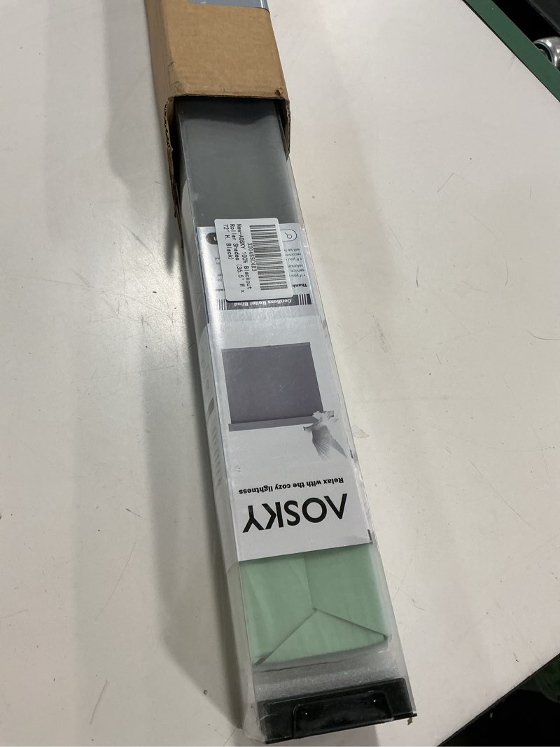 Condition photo showing Good Condition for AOSKY Blackout Roller Shades Cordless Blinds for Windows, Free-Stop Shades with Valance, Thermal Insulated Fabric, UV Protection, Natural Woven Blinds for Home and Office (36.5" W x 72" H, Black) Black 36.5"W x 72"H