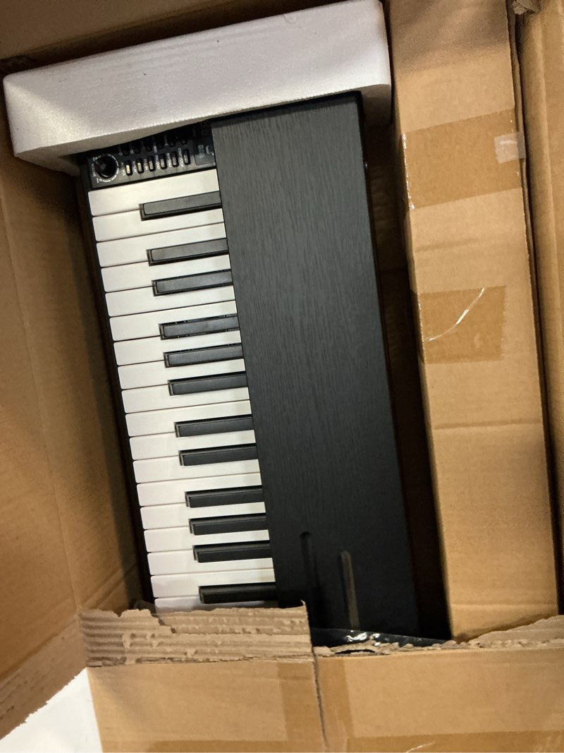 Condition photo showing Good Condition for digital piano keyboard for beginners,full size 88 key semi-weighted keyboard electric piano with stand,power adapter,sheet music stand,pedal,headphone,usb-midi compatibility,wood black urs25 with stand black
