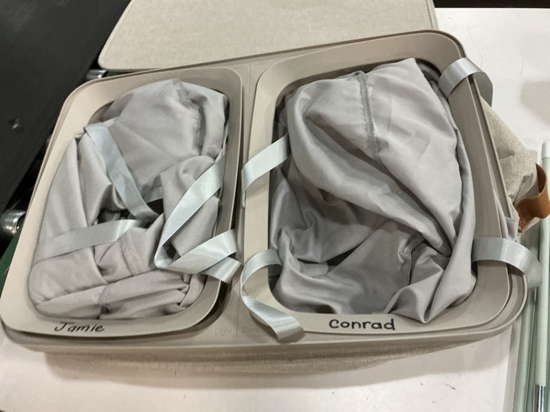 Condition photo showing As Is for SONGMICS Laundry Basket, 44.9 Gal. Laundry Hamper, 2 Compartments, Easy Assembly