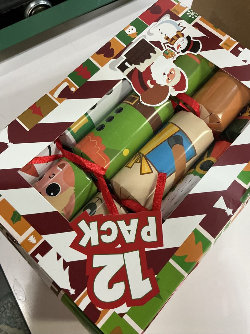 Condition photo showing Good Condition for 12 Pack Christmas No-Snap Party Table Favors, Christmas Party Supplies with Party Hat Joke & Little Surprise Toys Inside for Kids & Adults, Xmas Table Decorations Seasonal Holiday Dinner Table Gifts