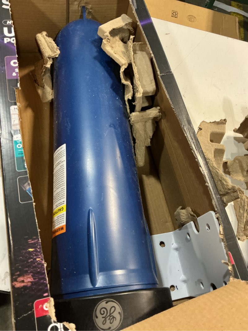 Condition photo showing As Is for ge heavy duty whole house water filtration system, reduces sediment, rust & more, install kit & accessories included, filter not included, replace filter (fxwpt, fxwpx) every 3 months, gxwh60t