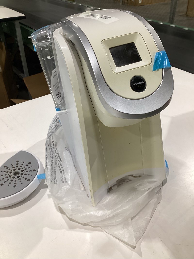 Condition photo showing As Is for ( USED, NOT TESTED) Keurig K-Iced Coffee Maker, Single Serve K-Cup Pod Iced Coffee Maker, With Hot and Cold Coffee Capabilities, Brews Any K-Cup Pod, White