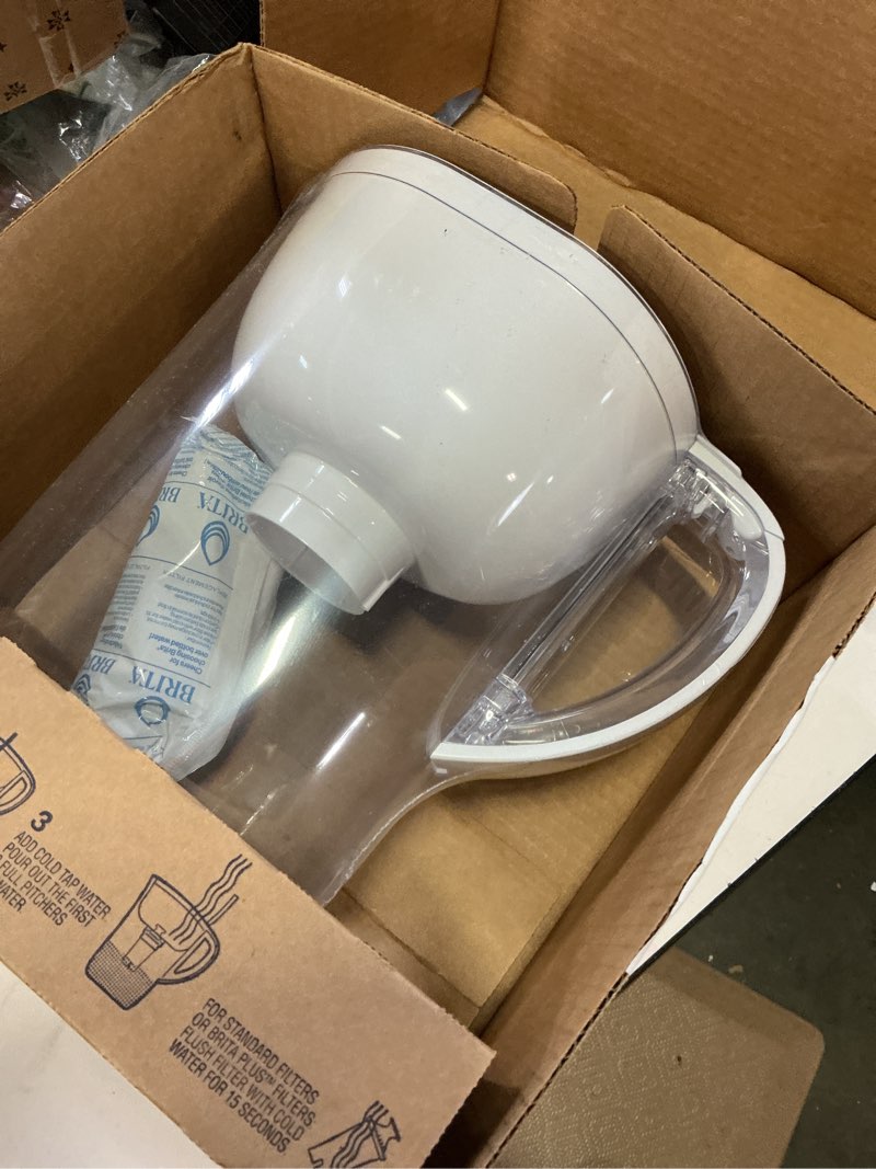 Condition photo showing New/Like New for brita large water filter pitcher for tap and drinking water, includes 1 standard filter, bpa-free, lasts two months, 10-cup capacity, bright white standard white
