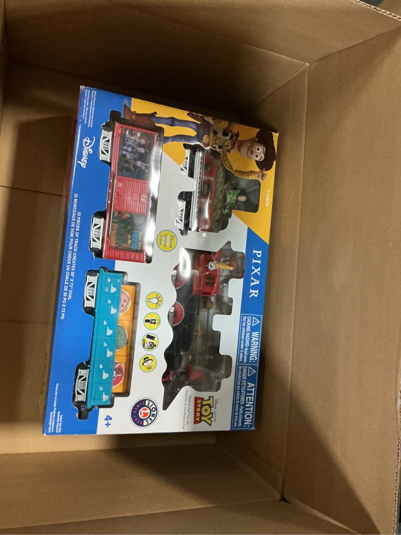 Condition photo showing New/Like New for Lionel Battery-Operated Disney Toy Story Toy Train Set with Locomotive, Train Cars, Track & Remote with Authentic Train Sounds, & Lights for Kids 4+ Ready-to-Play