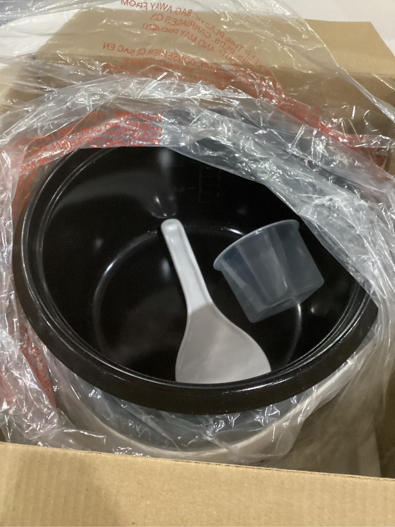 Condition photo showing As Is for black+decker 16-cup rice cooker, rc516, 8-cup uncooked rice, steaming basket, removable non-stick bowl, one touch