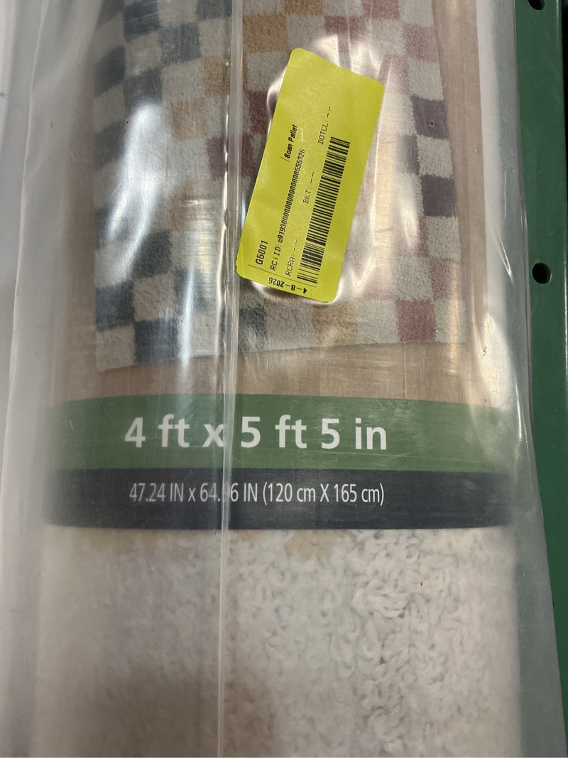 Condition photo showing New/Like New for 4 ft x 5 ft 5 in mainstays rainbow checkered shag indoor rug