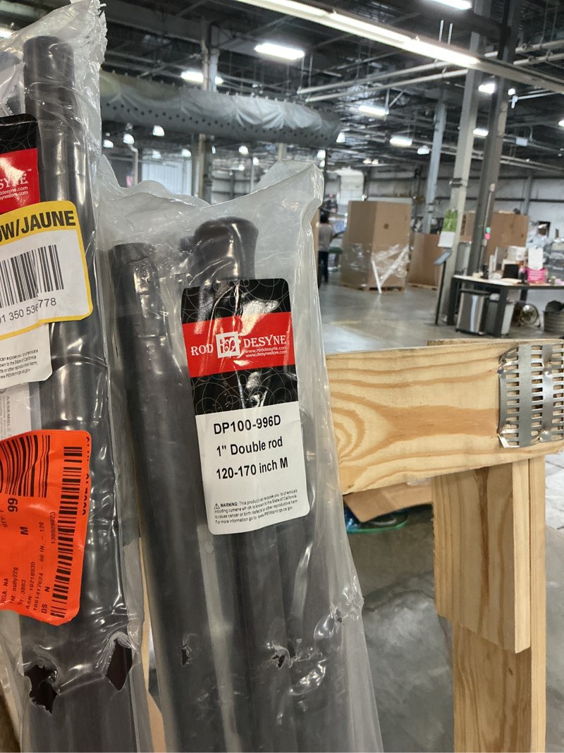 Condition photo showing New/Like New for 120 in. - 170 in. double curtain rod in black with globe finial