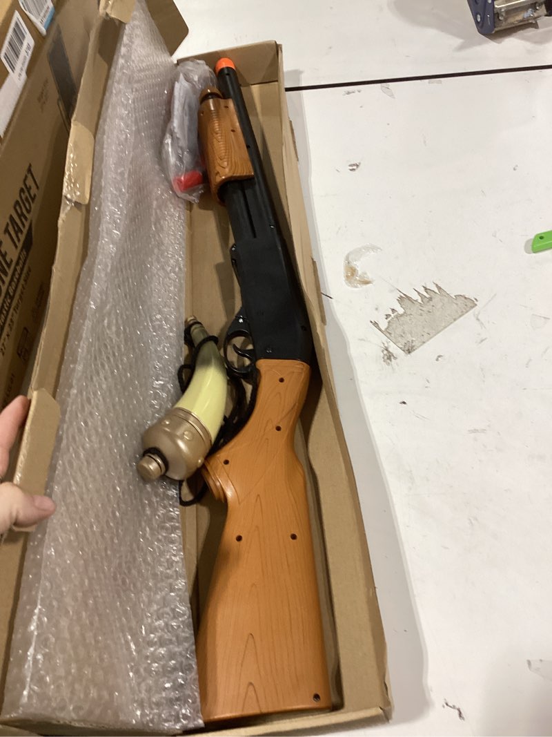 Condition photo showing Good Condition for toy shotgun pump action blaster with realistic sounds and 4 ejecting play shells pretend play cowboy costume wood grain design