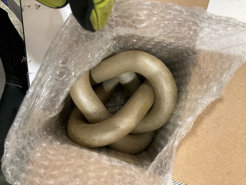 Condition photo showing As Is for 3 link wood knot decor