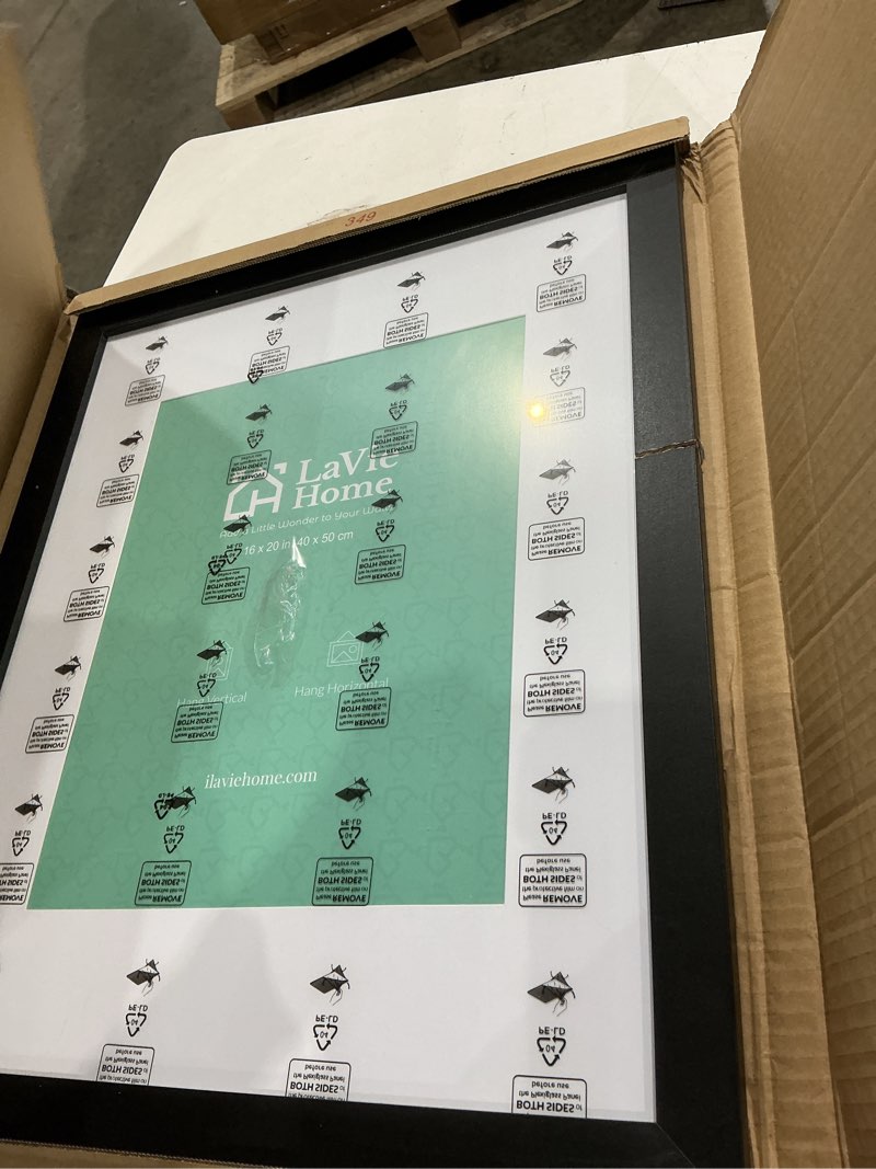 Condition photo showing As Is for lavie home 16x20 picture frame black poster frame,display pictures 11x14 with mat or 16x20 without mat, stable and sturdy frame and polished plexiglass, horizontal and vertical format of the walls 16x20 black