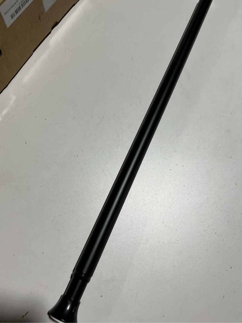 Condition photo showing As Is for Amazon Basics Tension Curtain Rod, Adjustable 24-36" Width - Black, Classic Finial Black 24-36" Indoor