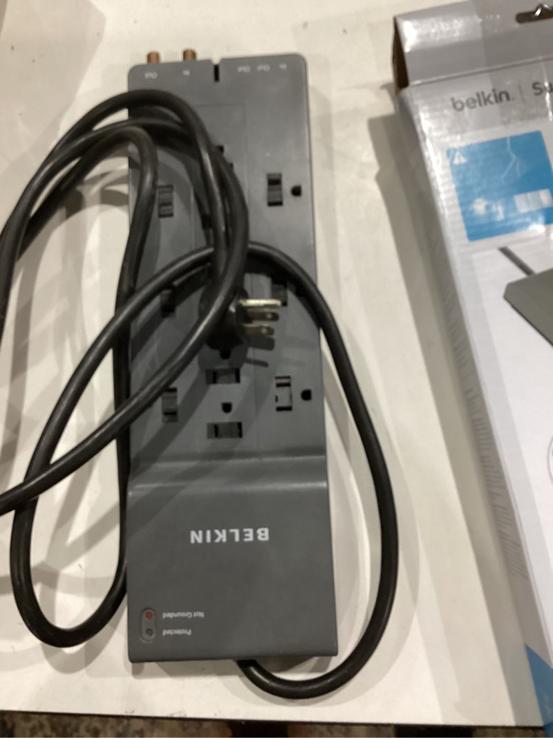 Condition photo showing As Is for belkin 12-outlet surge protector power strip w/ 12 ac outlets & 8ft flat plug, ul-listed heavy-duty extension cord for home, office, travel, computer, laptop, charger - 3,940 joules of protection 1 pack new version