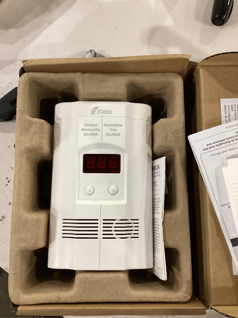 Condition photo showing Good Condition for kidde carbon monoxide + explosive gas, natural gas & propane alarm, plug-in with 9v battery backup, digital display, 85 db alarm, led status indicators, 3rd edition 1 pack 3rd edition