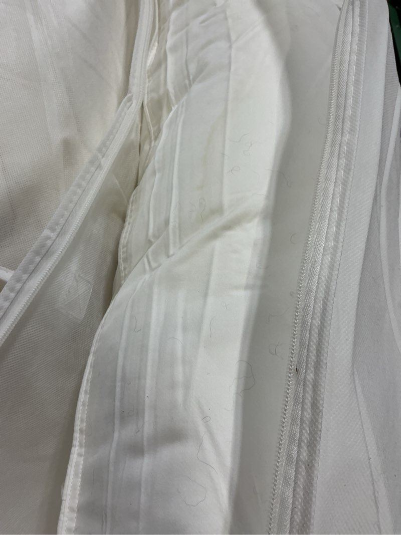 Condition photo showing As Is for premium down alternative pillow, king, medium/firm