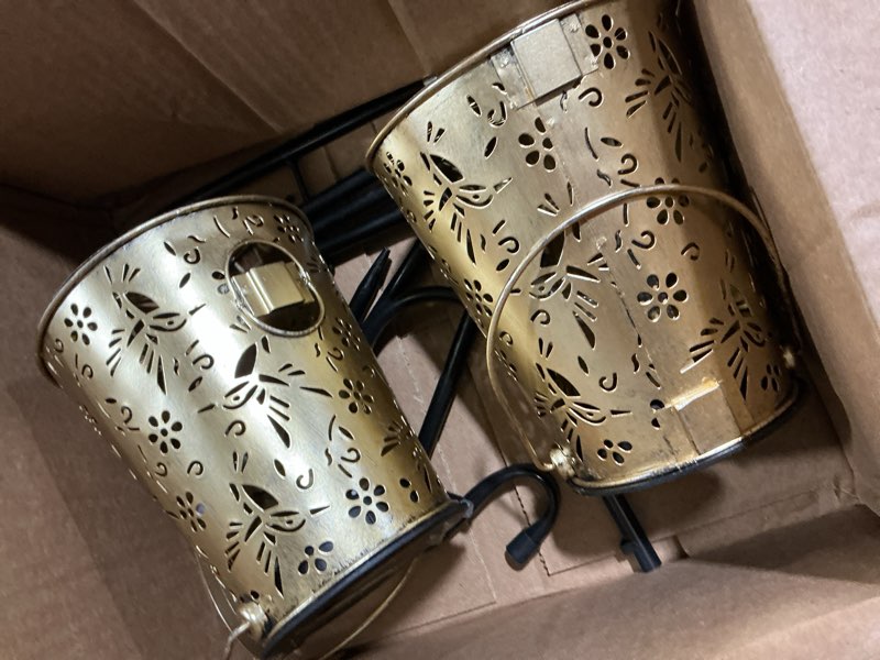Condition photo showing As Is for similar 2 pack solar lanterns outdoor