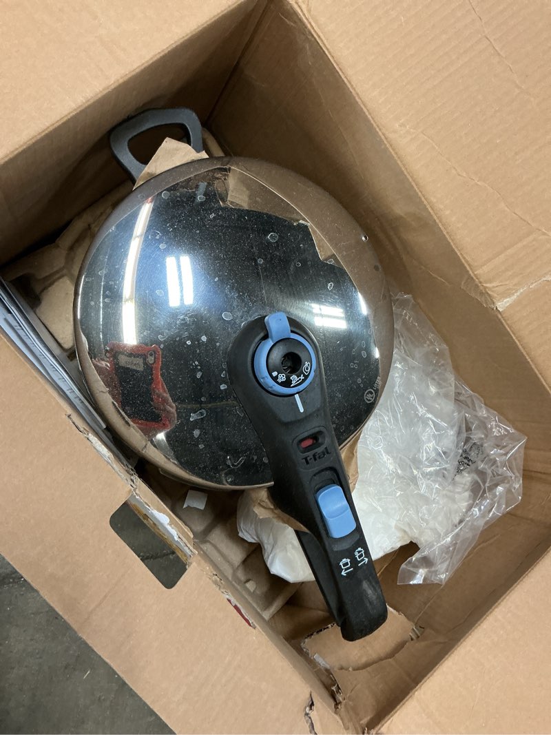 Condition photo showing As Is for t-fal trendy stainless steel pressure cooker, 8.5 quart, induction, secure locking mechanism, easy and safe opening, compatible with all cookstops, kitchen cookware, dishwasher safe, grey pressure cooker 8.5 quarts